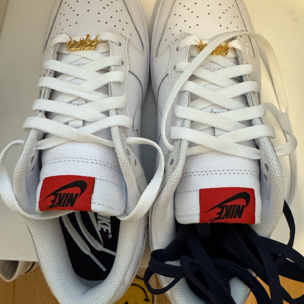 Nike White Sneakers with Red and Gold Accents